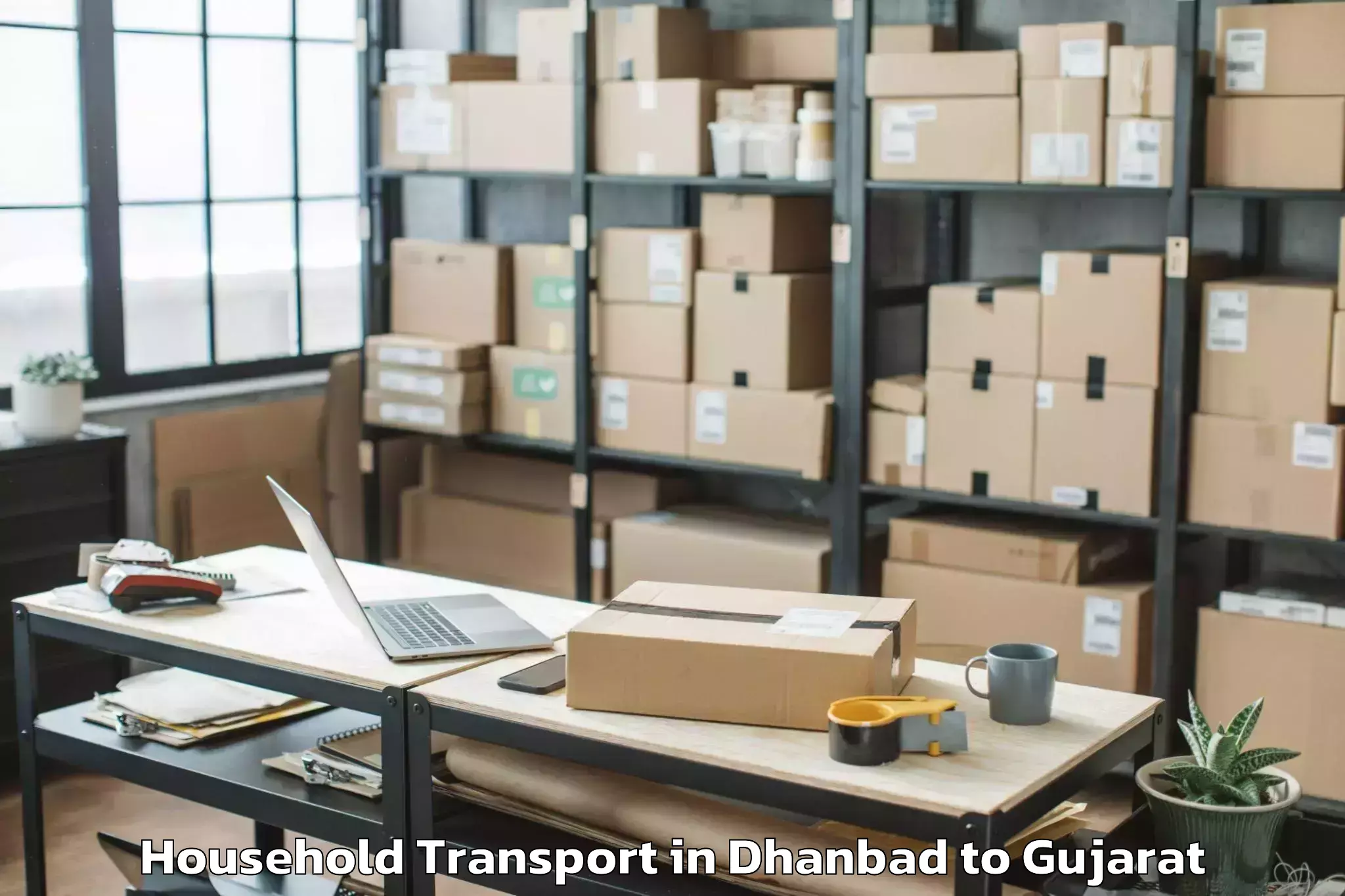 Hassle-Free Dhanbad to Crystal Mall Rajkot Household Transport